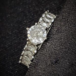 Silver ring with round solitaire and bageuttes, adjustable from sizes 6-8